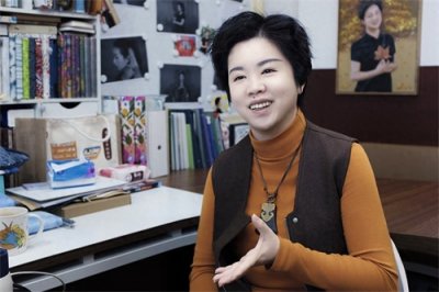 ​聋人教授郑璇：因为自己淋过雨，所以想为别人撑伞